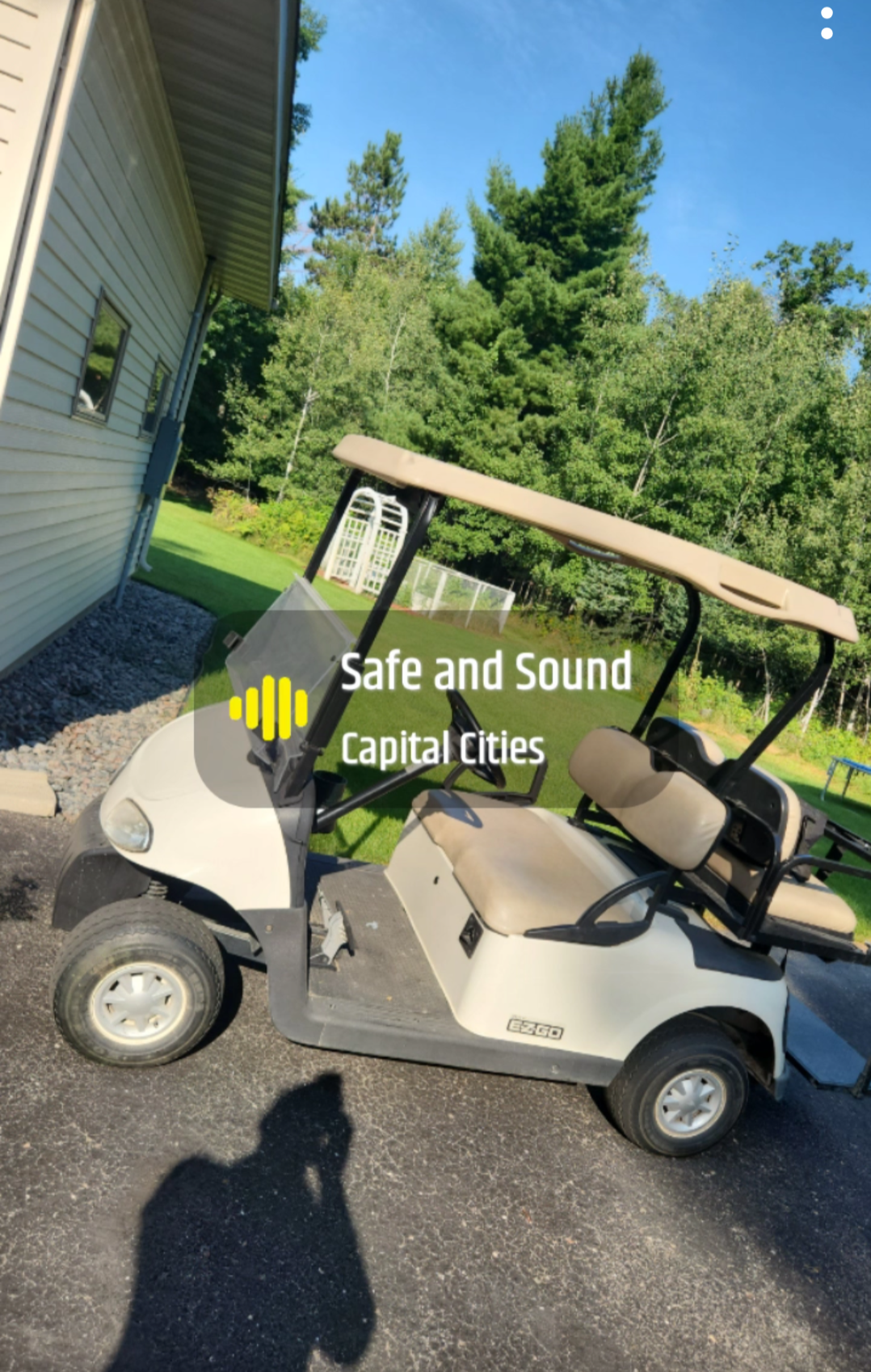 Jerad's E-Z-GO golf cart, home safe and sound in the driveway